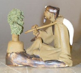 Ceramic Figurine: Man with Bonsai Tree Holding a Brush