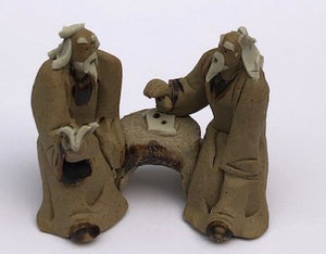 Ceramic Figurine-Two Mud Men Sitting On A Bench Reading Book-2